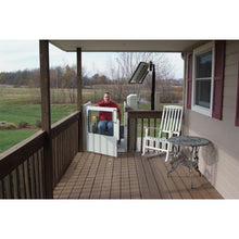 Load image into Gallery viewer, Outdoor Handicap Lift with Solar Panel at Deck Level
